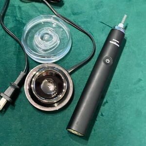 Philips Black Electric Toothbrush with Charging Base